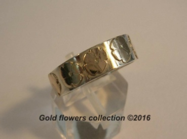 Gold flowers on a silver band
